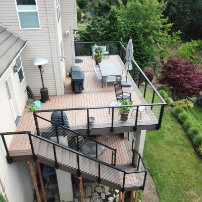 Trex Tiki Torch deck with fascia mounted cable railings