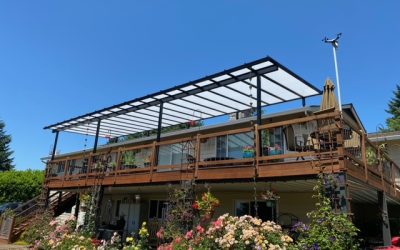 Acrylite patio cover with rain chains