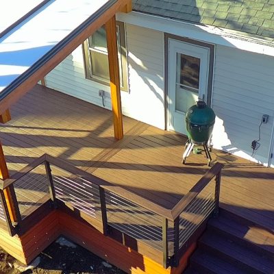 Wooden Framed Acrylite Cover and Trex Lava Rock Deck with Cable Railings and Trex Cocktail Rail