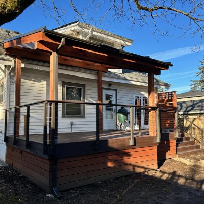 Wooden Framed Acrylite Cover and Trex Lava Rock Deck with Cable Railings and Lights