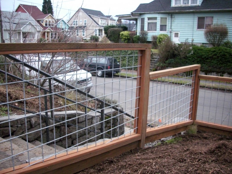 Galvanized wire fence with Pressure treated frame | Deck Masters, LLC