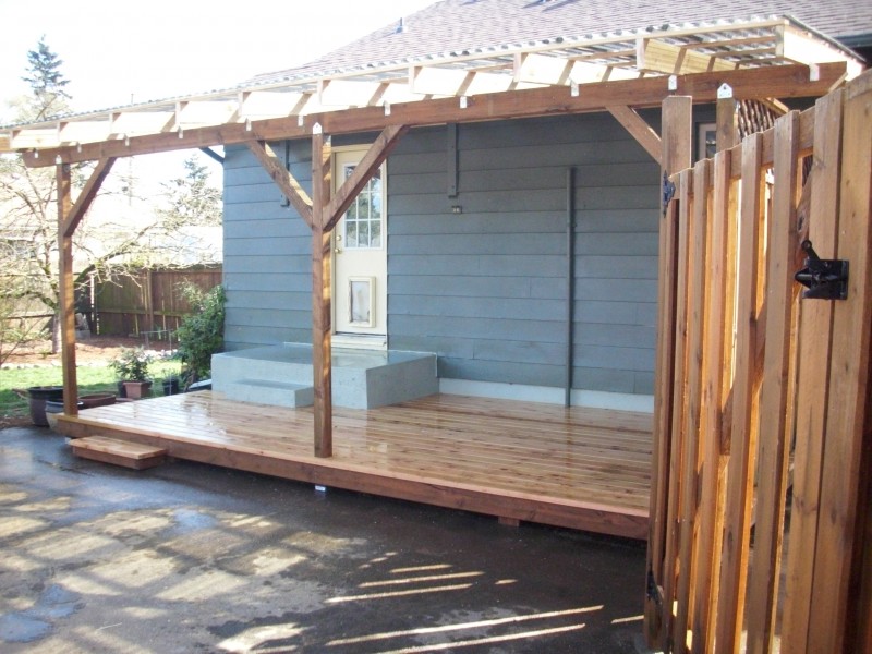 Cedar deck w/ polycarbonate patio cover and recycled gates | Deck ...