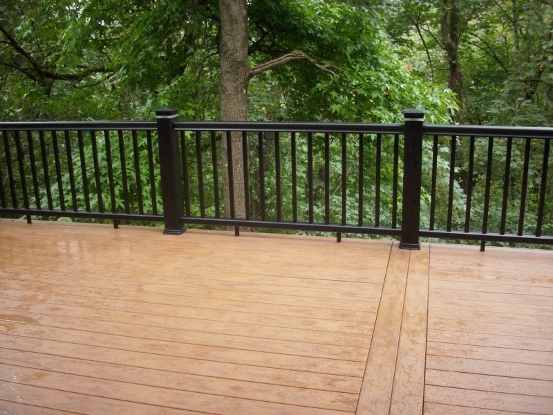 Elevated hillside PVC deck | Deck Masters, LLC