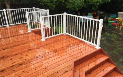 Cedar deck with aluminum railing in white