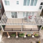 Composite deck and cedar pergola